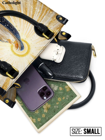 Catholight  Our Lady’s Eternal Glow Leather Bag