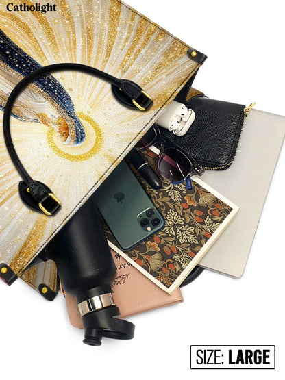 Catholight  Our Lady’s Eternal Glow Leather Bag